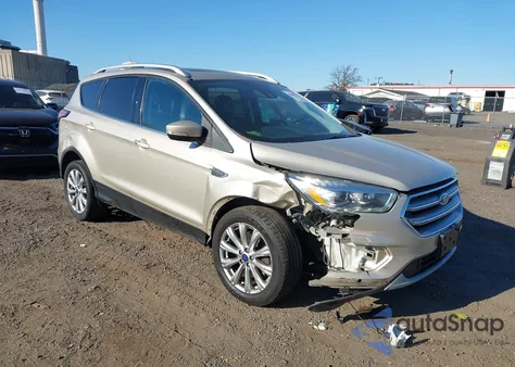 2017 Ford Escape Titanium from USA, damaged, VIN 1FMCU9J94HUB64676